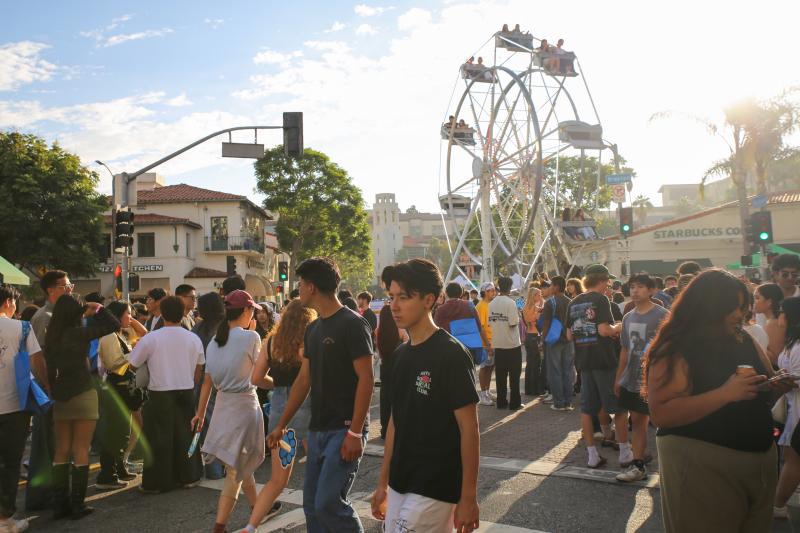 Students in front of the ferris wheel