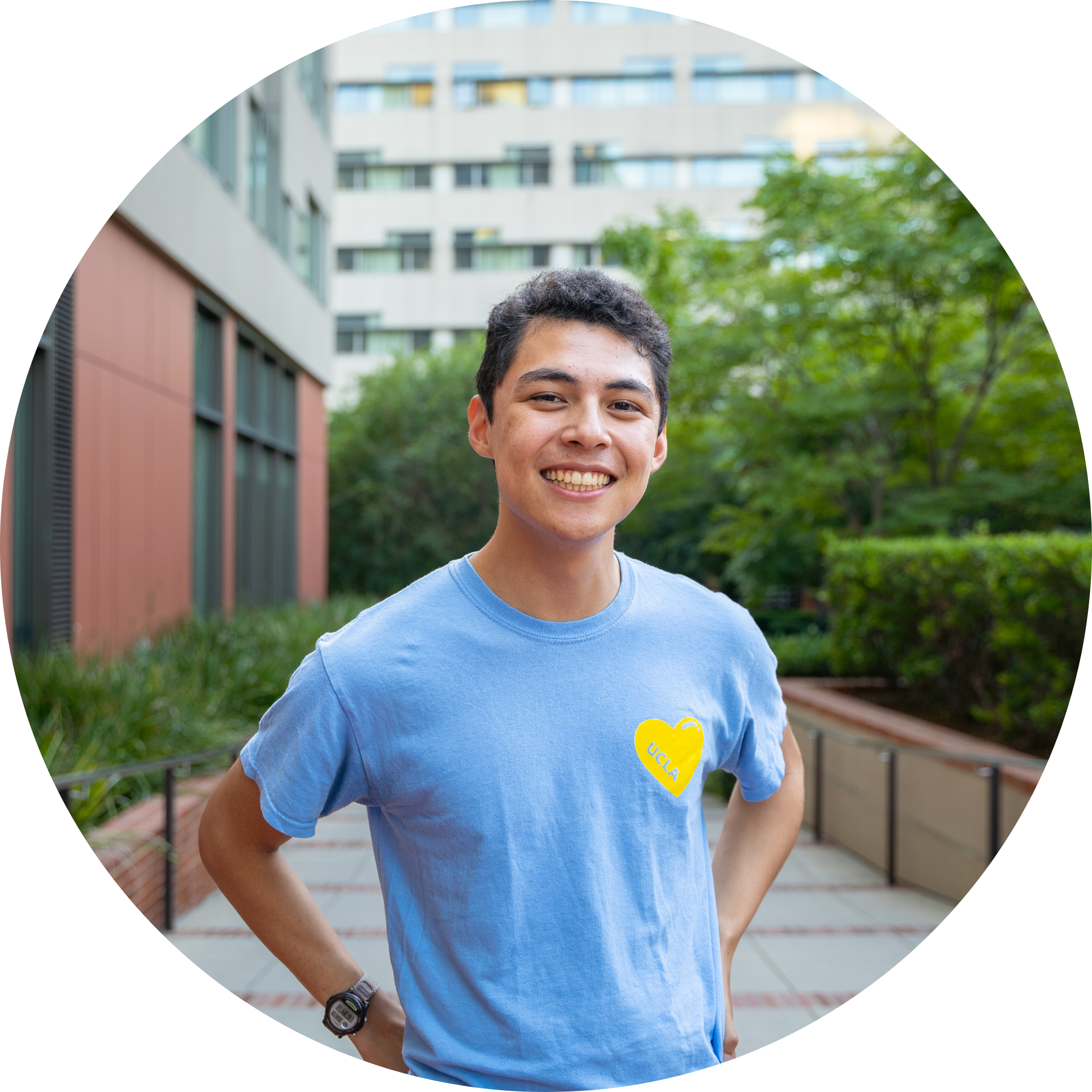 Photo of student standing outside of residential hall.